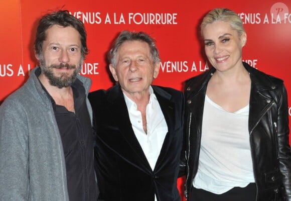Mathieu Amalric, Roman Polanski et Emmanuelle Seigner lors de la première du film La Vénus à la fourrure à Paris le 4 novembre 2013.