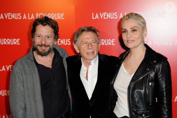 Mathieu Amalric, Roman Polanski et Emmanuelle Seigner lors de la première du film La Vénus à la fourrure à Paris le 4 novembre 2013.