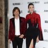 Mick Jagger et sa compagne L'Wren Scott assistent aux Harper's Bazaar Women of the Year Awards à l'hôtel Claridge's. La créatrice a remporté le prix de Trendsetteuse de l'année lors de la cérémonie. Londres, le 5 novembre 2013.