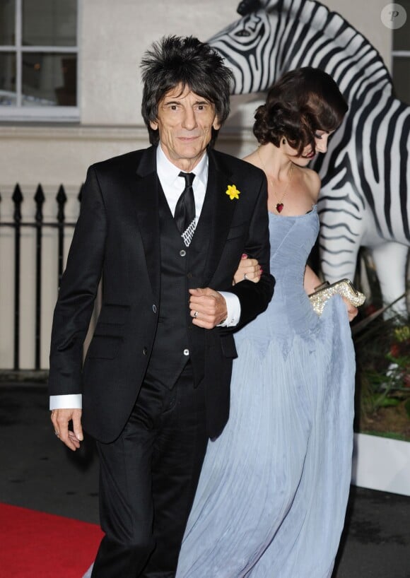 Ronnie Wood et sa femme Sally Humphreys à Londres, le 12 septembre 2013.