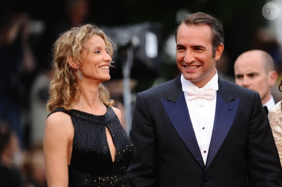 Jean Dujardin et Alexandra Lamy lors de la projection des Bien-aimés au Festival de Cannes le 22 mai 2011