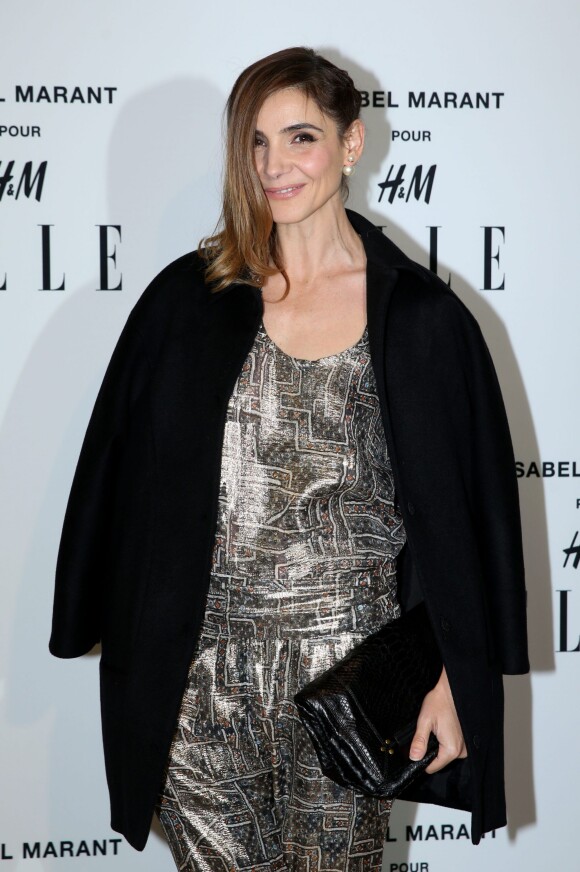 Clotilde Courau (la princesse Clotilde de Savoie) assiste à la soirée "Isabel Marant pour H&M" sur les Champs Elysees à Paris le 13 novembre 2013