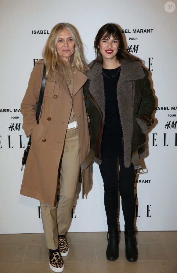 Jeanne Damas assiste à la soirée "Isabel Marant pour H&M" sur les Champs Elysees à Paris le 13 novembre 2013