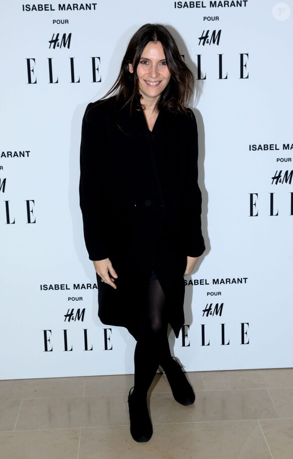 Geraldine Pailhas assiste à la soirée "Isabel Marant pour H&M" sur les Champs Elysees à Paris le 13 novembre 2013