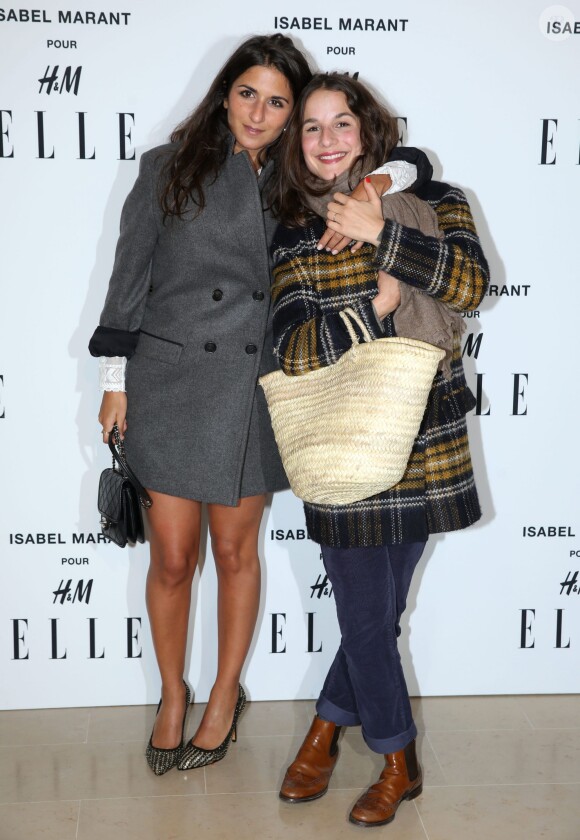 Geraldine Nakache et une amie assistent à la soirée "Isabel Marant pour H&M" sur les Champs Elysees à Paris le 13 novembre 2013