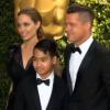 Angelina Jolie, Brad Pitt et leur fils Maddox lors de l'arrivée des stars à la soirée des Governors Awards où sont remis des Oscars d'honneur, à Los Angeles le 16 novembre 2013