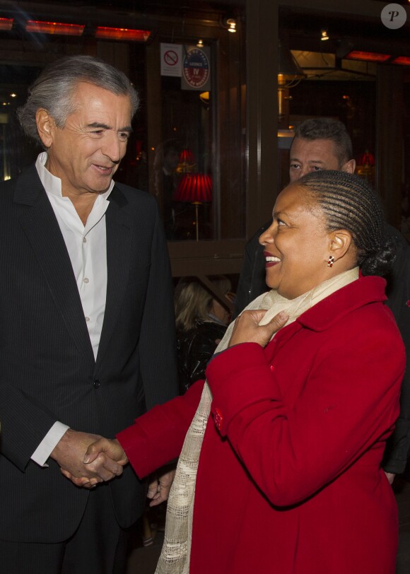 Bernard-Henri Lévy et Christiane Taubira se mobilisent contre le racisme au cours d'une rencontre à réunissant de nombreux intellectuels au cinéma le Saint-Germain à Paris le 17 novembre 2013.