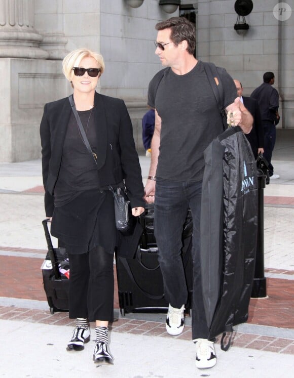 Hugh Jackman et sa femme Deborra-Lee Furness arrrivent à Washington, le 8 octobre 2013.