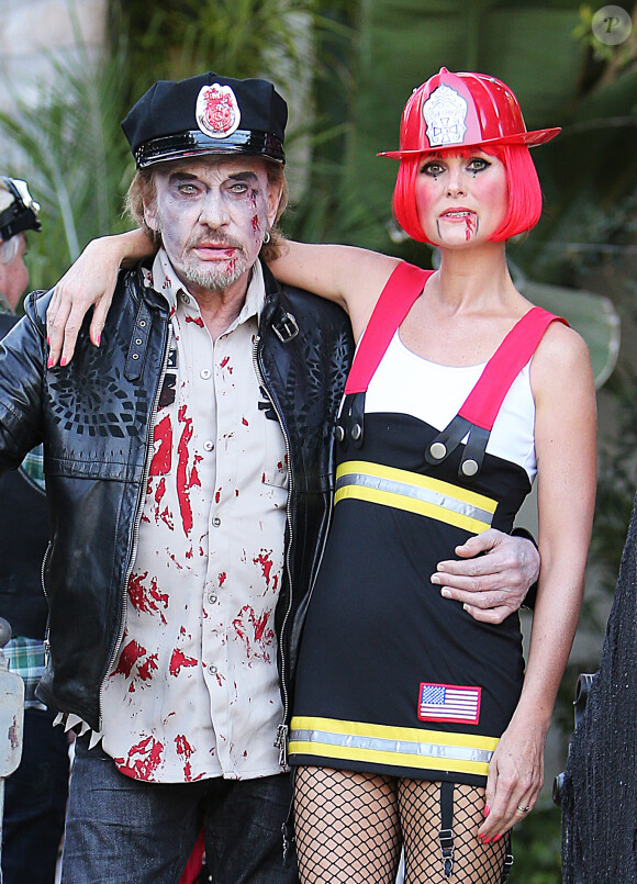 Exclusif - Laeticia Hallyday et Johnny Hallyday maquillés pour Halloween à Los Angeles le 31 octobre 2013.