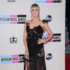 Heidi Klum splendide en robe noire arrive aux American Music Awards à Los Angeles le 24 novembre 2013