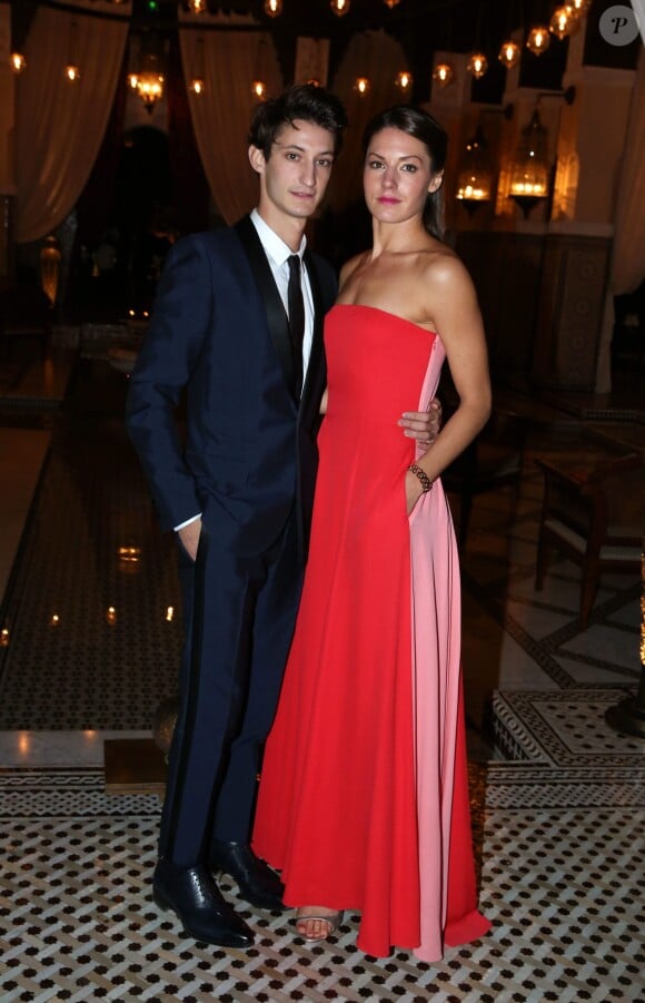 Pierre Niney et sa compagne Natasha Andrews à la soirée Dior dans le cadre du 13e Festival International du Film de Marrakech, le 1er décembre 2013.