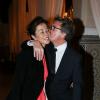 François Cluzet embrasse sa femme Narjiss à la soirée Dior dans le cadre du 13e Festival International du Film de Marrakech, le 1er décembre 2013.