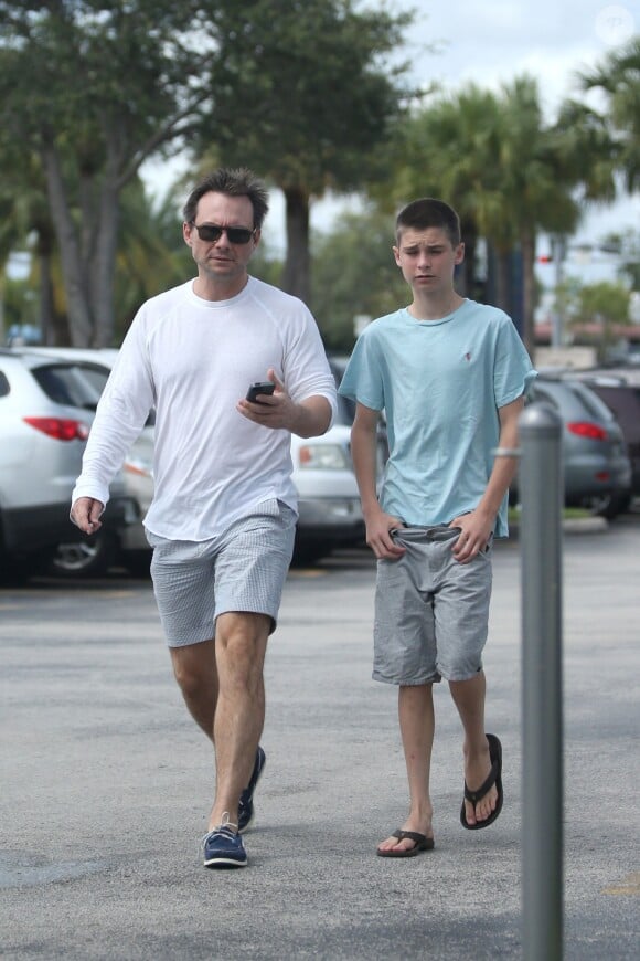 Christian Slater et son fils Jaden à Miami, le 14 juillet 2013.