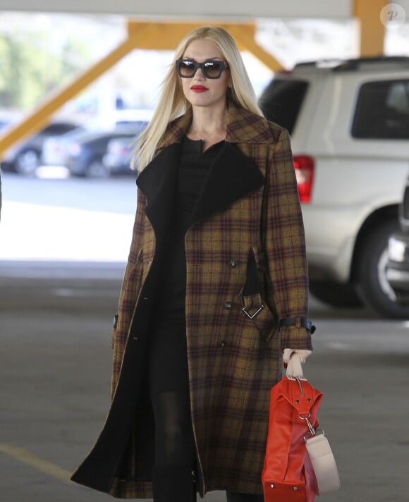 Gwen Stefani, enceinte et en pleine séance shopping à Los Angeles. Le 4 décembre 2013.