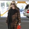 Gwen Stefani, enceinte et en pleine séance shopping à Los Angeles. Le 4 décembre 2013.