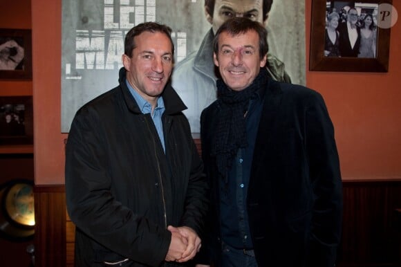 Philippe Sella et Jean-Luc Reichmann au Club de l'Etoile à Paris le 10 decembre 2013 pour la projection en avant-première de la série "Leo Matteï".