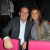 Jean-Pierre Pernaut et sa femme Nathalie Marquay au spectacle Robin des bois, au Palais des Congrès à Paris, 2013.
