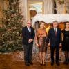 Le roi Philippe et la reine Mathilde de Belgique ont posé en compagnie du prince Laurent et de la princesse Claire avant d'assister le 11 décembre 2013 au concert de Noël au palais royal, à Bruxelles.