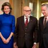 Le roi Philippe de Belgique et la reine Mathilde accueillaient le 16 décembre 2013 le Prix Nobel de Physique François Englert, récompensé pour ses travaux sur le boson de Higgs, au palais royal, à Bruxelles.