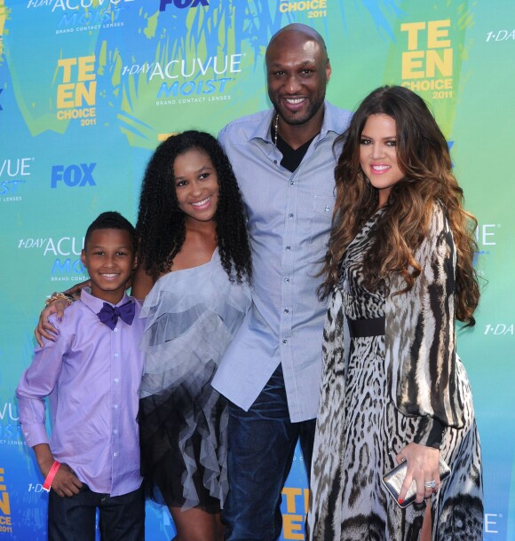 Lamar Odom, sa fille Destiny, son fils Lamar Jr. et Khloé Kardashian à Los Angeles en août 2011.