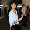 Lily Aldridge arrive à Los Angeles, le 18 decembre 2013, dans un look rock et bohème.