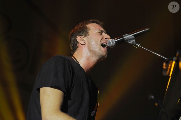 Chris Martin (Coldplay) lors du concert de charité "Under1Roof" à Londres, le 19 décembre 2013.