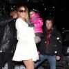 Mariah Carey et sa petite Monroe font du shopping sous la neige pendant leur séjour à Aspen, le 20 décembre 2013.