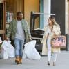 Kanye West et Kim Kardashian quittent la boutique Sports Limited dans le quartier de Woodland Hills à Los Angeles. Le 26 décembre 2013.