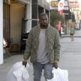 Kanye West quitte la boutique Sports Limited à Woodland Hills. Los Angeles, le 26 décembre 2013.