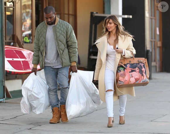 Kanye West et Kim Kardashian quittent la boutique Sports Limited à Los Angeles, le 26 décembre 2013.