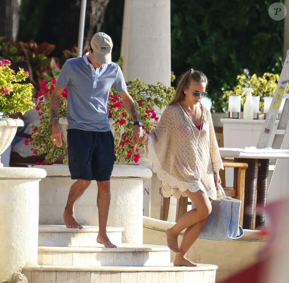 Marc Anthony et sa compagne Chloe Green en vacances à la Barbade le 1er Janvier 2014.