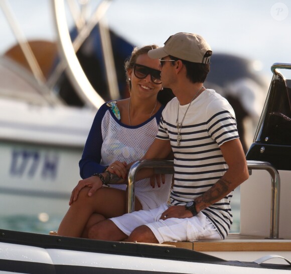 Marc Anthony et sa compagne Chloe Green en vacances à la Barbade le 31 décembre 2013.