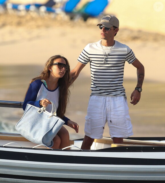 Marc Anthony et sa compagne Chloe Green en vacances à la Barbade le 31 décembre 2013.