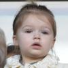Harper Beckham dans les tribunes du parc des Princes à Paris. Le 9 mars 2013.