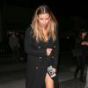 Kim Kardashian, ravissante et tout de noir vêtue, quitte le restaurant La Scala après un dîner avec son amie Brittny Gastineau. Beverly Hills, le 4 janvier 2014.