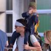 Exclusif - Levi sur les épaules de son père - Matthew McConaughey en famille à l'aéroport de Los Angeles le 30 décembre 2013. Matthew McConaughey et sa femme Camila Alves rentrent de leur voyage au Brésil avec leurs enfants Levi, Vida et Livingston.