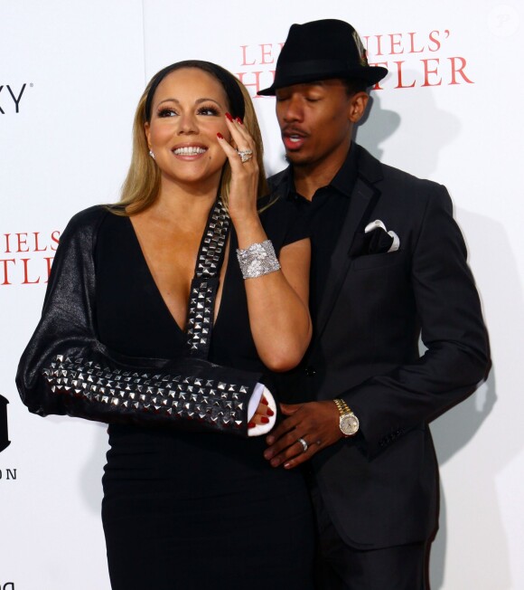 Mariah Carey (le bras cassé) et son mari Nick Cannon à New York, le 5 août 2013.