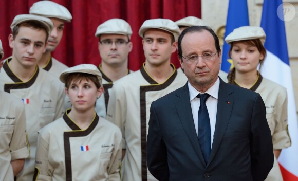 François Hollande et Valérie Trierweiler lors de la traditionelle cérémonie de la galette républicaine de l'Elysée, le 8 janvier 2014 à Paris
