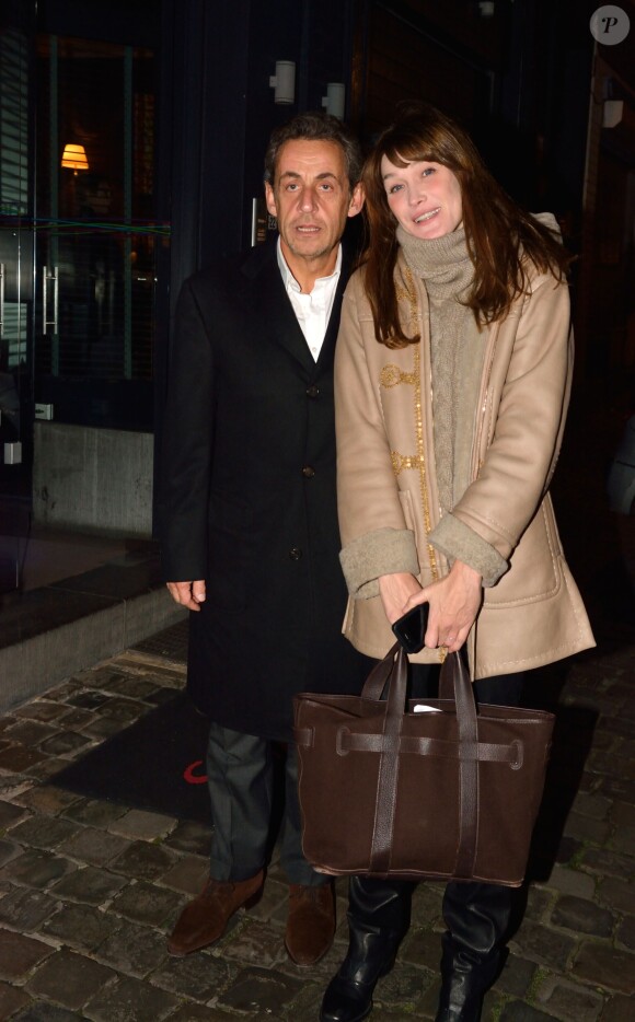 Exclusif - Nicolas Sarkozy et Carla Bruni à Bruxelles pour la tournée de la chanteuse, le 13 décembre 2013.