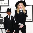 Madonna aux Grammy Awards. La star est arrivée avec son fils David avant de chanter "Open Your Heart" lors du mariage de 33 couples sur la scène du Staples Center, à Los Angeles le 26 janvier 2014.