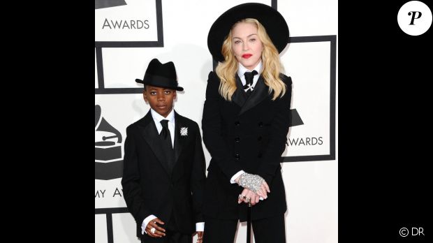 Madonna aux Grammy Awards. La star est arrivée avec son fils David avant de chanter &quot;Open Your Heart&quot; lors du mariage de 33 couples sur la scène du Staples Center, à Los Angeles le 26 janvier 2014.