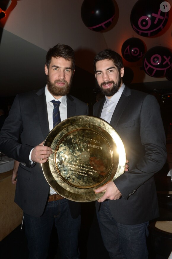 Luka et Nikola Karabatic au restaurant la Gioia à Paris pour célébrer le titre de champion d'Europe de handball décroché face au Danemark, le 27 janvier 2014