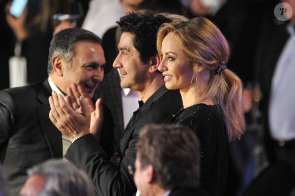 Adriana Karembeu et son compagnon André Ohanian lors du championnat du monde WBA des poids moyens Gennady Golovkin et Osumanu Adama à Monaco, le 1er février 2014