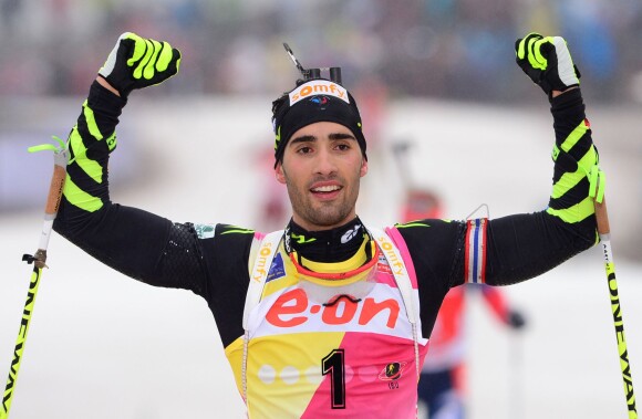 Martin Fourcade après sa victoire sur le 15 km départ en ligne lors de la Coupe du monde à la DKB ski arena de Oberhof, le 5 janvier 2014