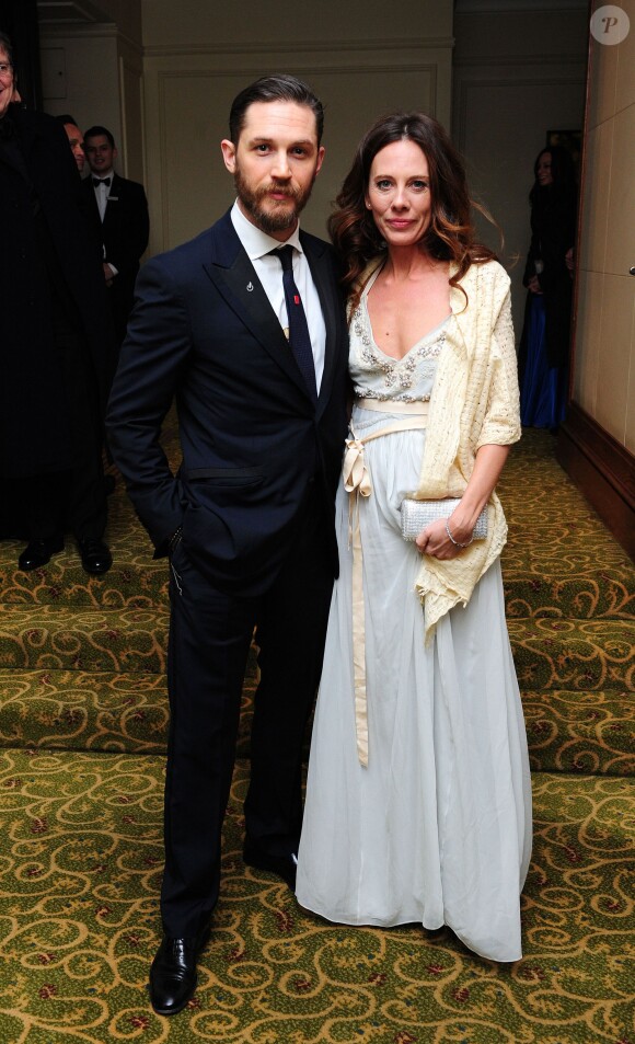 Tom Hardy et son amie Kelly Marcel lors de la cérémonie des BAFTA Awards à Londres le 16 février 2014