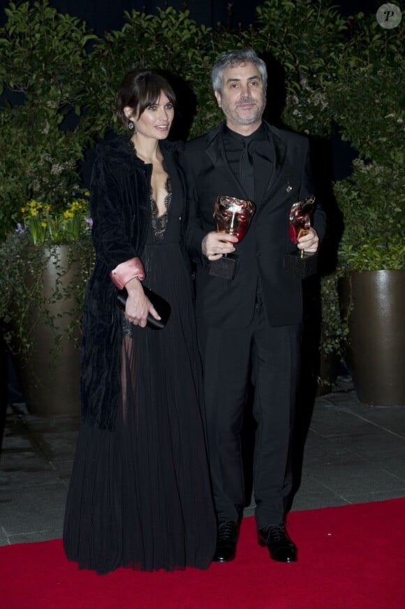 Alfonso Cuaron et Sheherazade Goldsmith lors de la cérémonie des BAFTA Awards à Londres le 16 février 2014