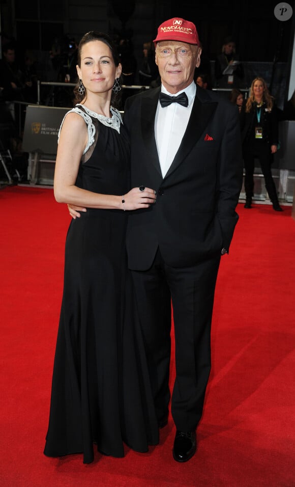 Niki Lauda et sa femme Birgit Wetzinger lors de la cérémonie des BAFTA Awards à Londres le 16 février 2014