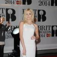 Pixie Lott assiste aux Brit Awards 2014 à l'O2 Arena. Londres, le 19 février 2014.