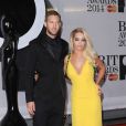 Calvin Harris et Rita Ora assistent aux Brit Awards 2014 à l'O2 Arena. Londres, le 19 février 2014.