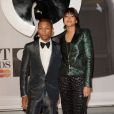 Pharrell Williams et Helen Lasichanh assistent aux Brit Awards 2014 à l'O2 Arena. Londres, le 19 février 2014.
